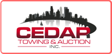 A red and black logo for cedar towing & auction inc.